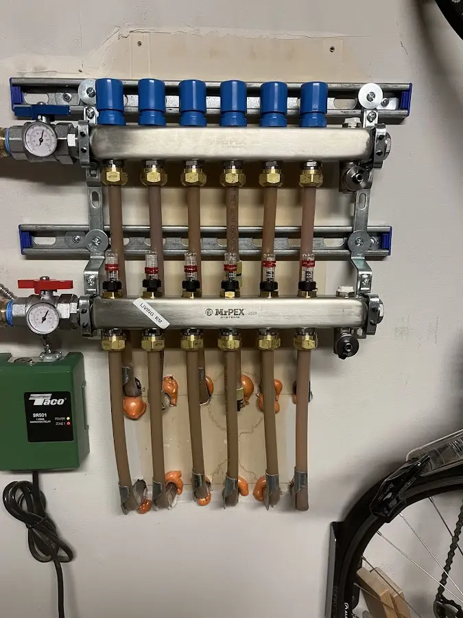 Plumber performing Water Heater Repair at a residential property in Whitemarsh